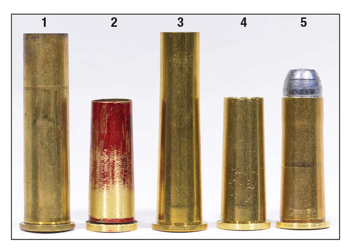 Various stages in production of the 11.2 Werndl (or 11.3 Montenegrin): (1) It can be made from either 45-70 or 40-65 brass. The (2) red-tinted one was made by Lee Shaver from a 45-70 case, patterned on the chamber cast. (3) the 40-65 brass, then (4) a case cut down and trimmed and finally, (5) a loaded round.